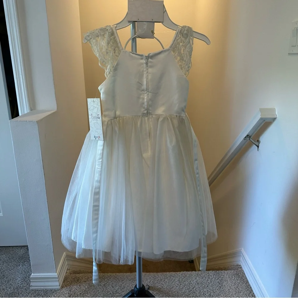 Biscotti Flower Girl White Dress with Lace Shoulders & Matching Bow Headband